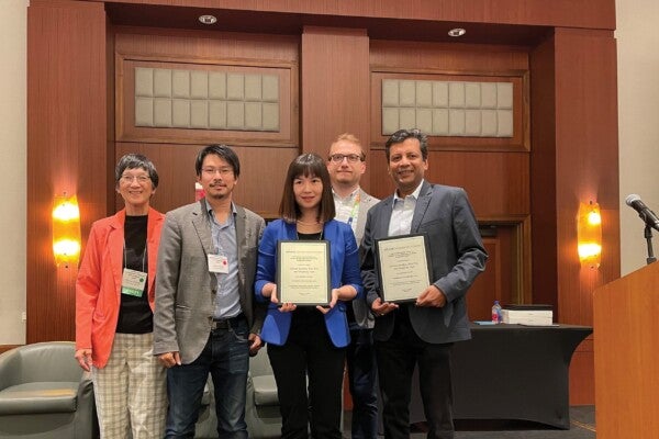 Trio Wins Best Paper Award at ISS Conference in October Wen Wen and Bardhan small