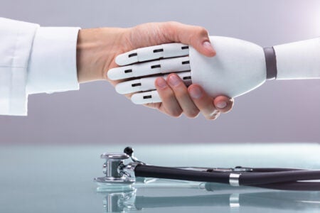 Doctor And Robot Shaking Hands