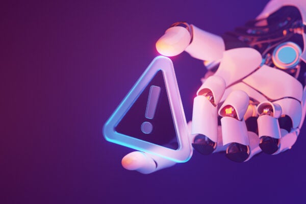 Futuristic Robotic Hand Holding a Glowing Warning Sign in Cyber Space