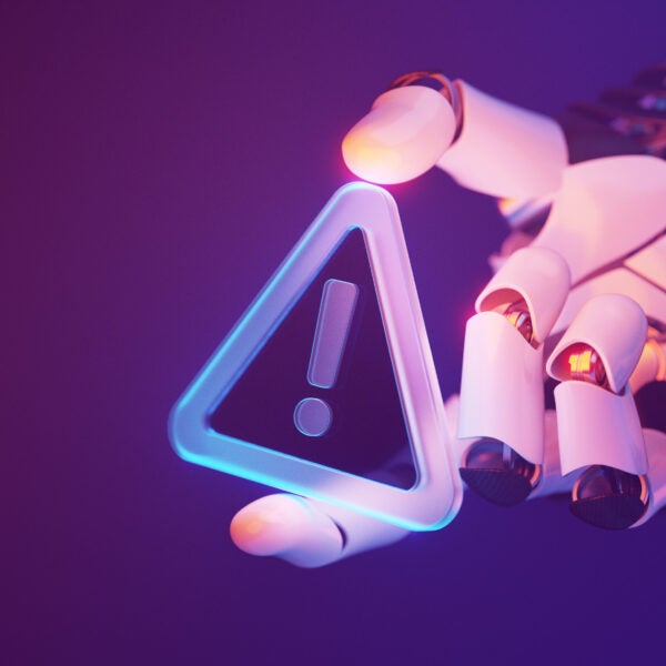Futuristic Robotic Hand Holding a Glowing Warning Sign in Cyber Space