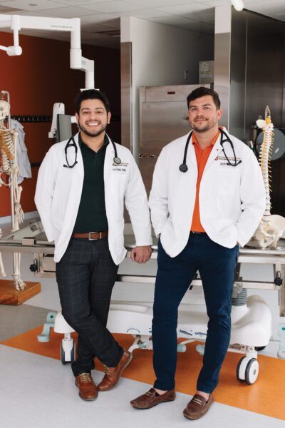 Jon Trujillo, left, and Justin Jensen are students at Dell MedicalSchool and are also pursuing MBAs at Texas McCombs.